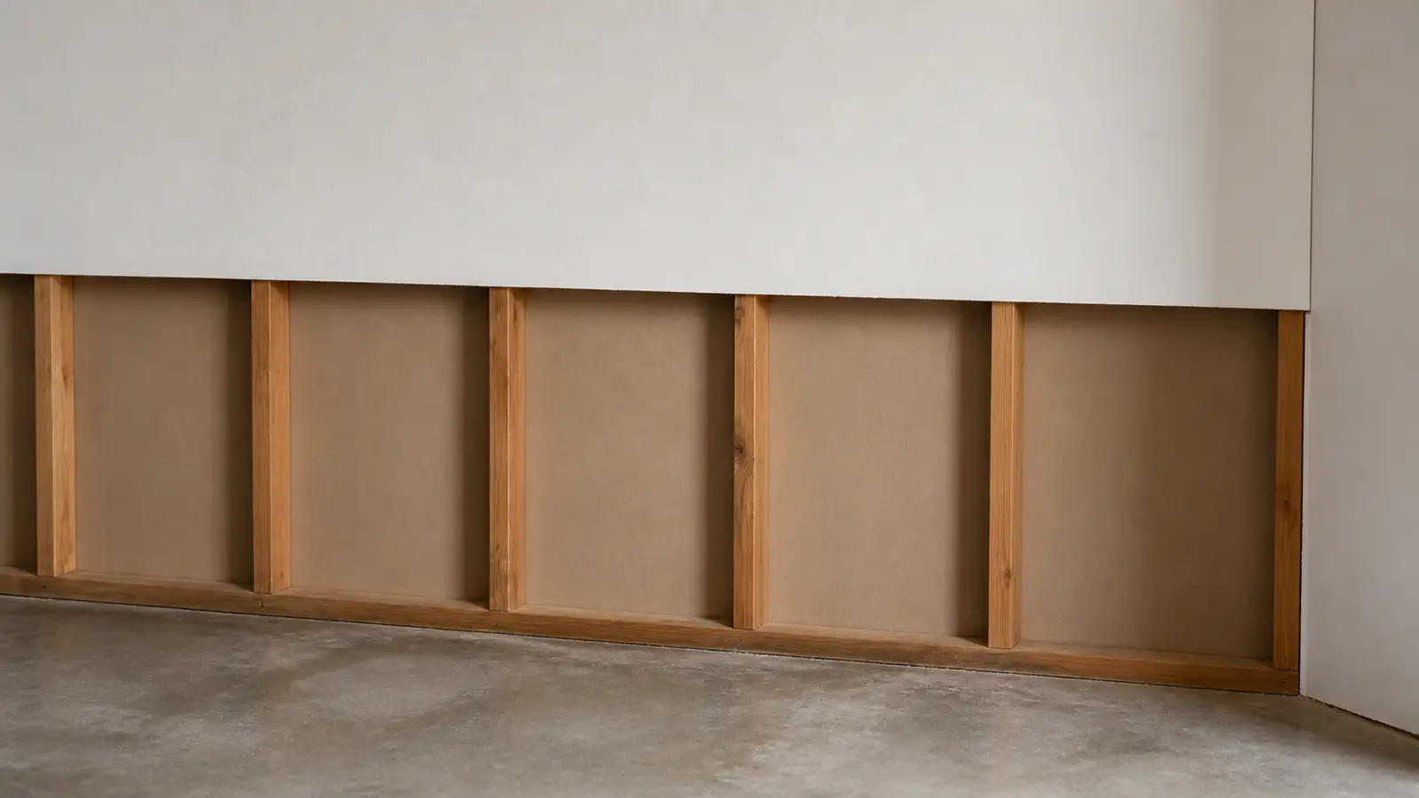 Measured drywall cut-back above a flood-affected lower wall